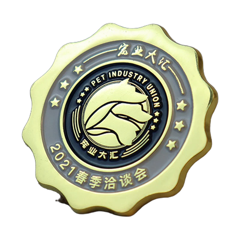 Round enamel organization pin with a gold-colored scalloped border