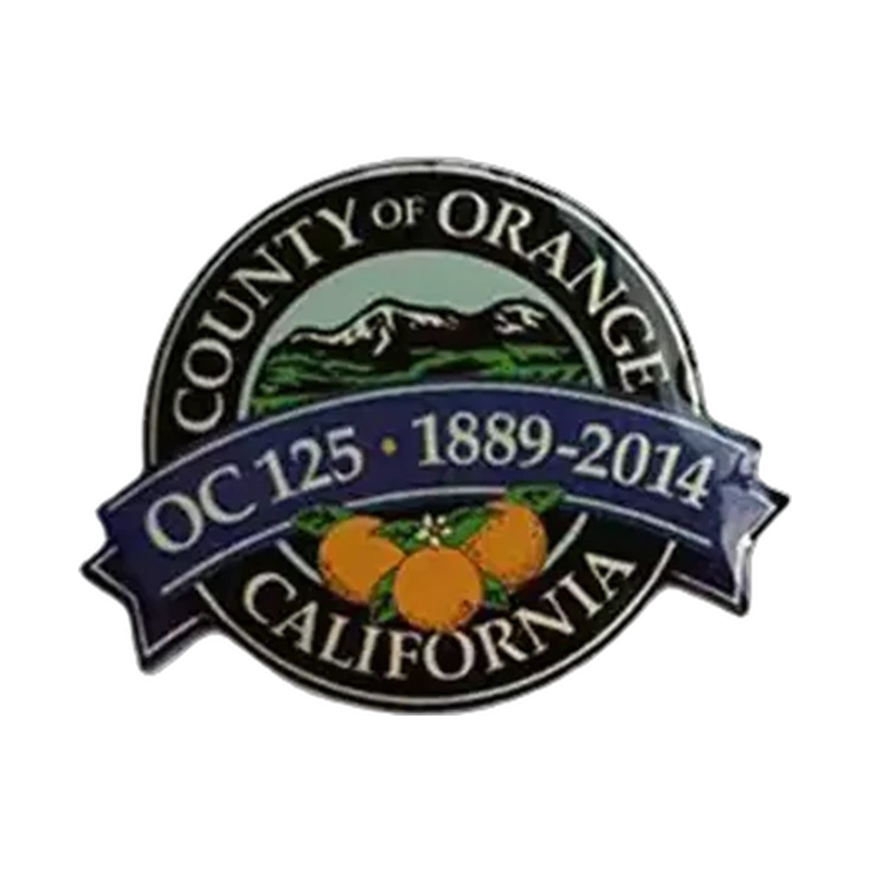 Offset printed anniversary pin with detailed text and landscape artwork
